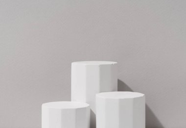 Gri Arkaplanda Üç Geometrik Beyaz Yaya Gösterimi Minimalist Ürün Sunumu