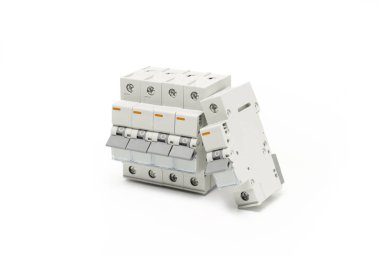 Automatic circuit breakers on white background. Studio shot.
