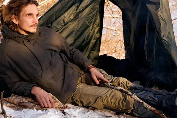 Calm Relaxed Caucasian Guy Warm Clothes Lying Next Tent Camping — Stockfoto