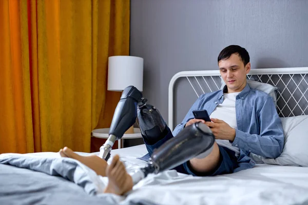 Impaired Caucasian Man Artificial Leg Prosthesis Checking Messages Watching Video — Stock Photo, Image