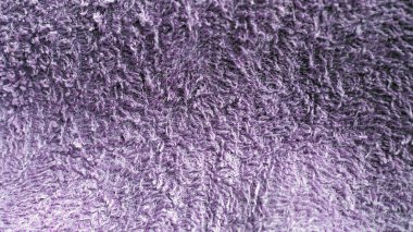 Violet eski terry kumaş dokusu arka planı. Soluk mor terry pamuk havlu yakın görüş. Ev yapımı banyo havlusu, kullanılmış havlu dokuyu kapat..