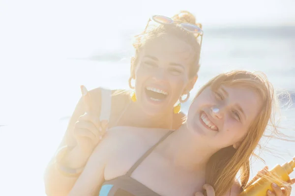 Portrait Happy Modern Mother Child Beach Beachwear Applying Sunscreen — Stock Photo, Image
