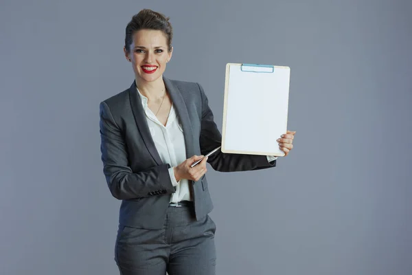 Happy Elegant Small Business Owner Woman Grey Suit Clipboard Isolated — Stok fotoğraf
