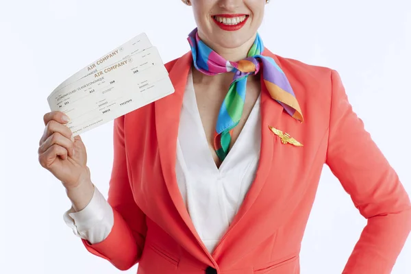 Closeup Happy Elegant Female Stewardess White Background Uniform Flight Tickets — Stock Photo, Image