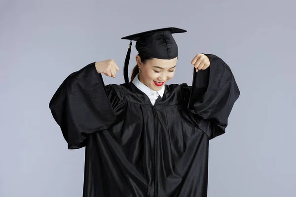 Proud Young Female Asian Graduate Student Graduation Gown Cap Showing — Stockfoto