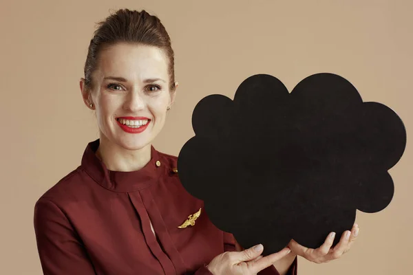 Happy Stylish Stewardess Woman Beige Background Cloud Shaped Blackboard — Stock Photo, Image