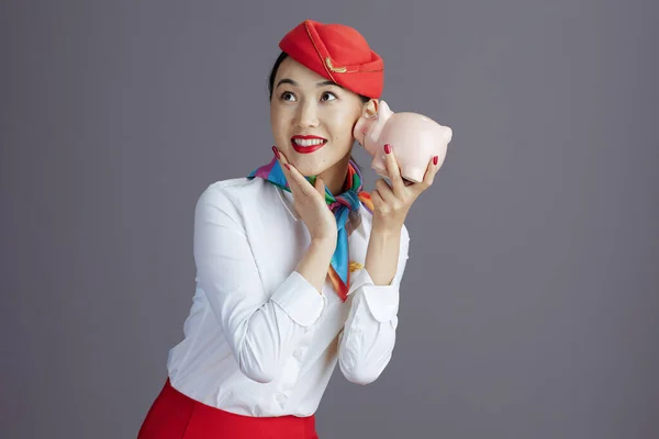 Cheerful Modern Asian Female Flight Attendant Red Skirt Hat Uniform — Stock Photo, Image