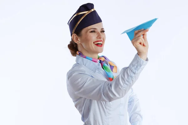 Happy Stylish Female Flight Attendant White Background Uniform Paper Airplane — Stock Photo, Image