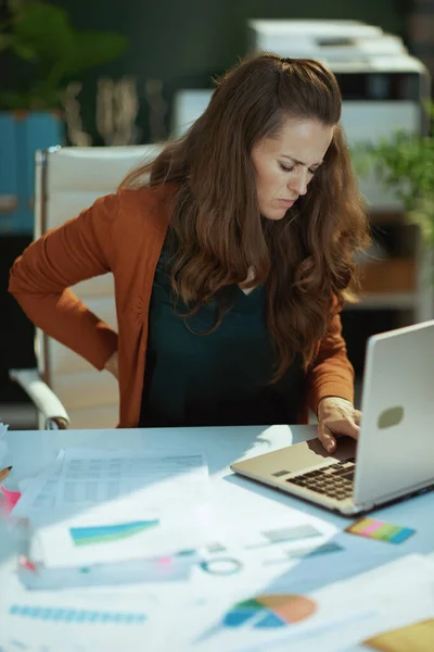Stressed Modern Small Business Owner Woman Laptop Back Pain Modern — Φωτογραφία Αρχείου