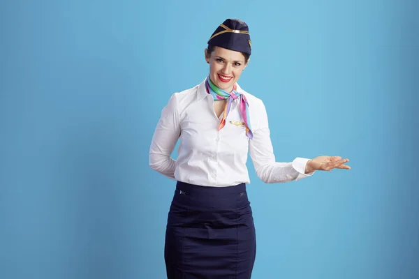 Happy Elegant Flight Attendant Woman Blue Background Uniform Welcoming — Stock Photo, Image