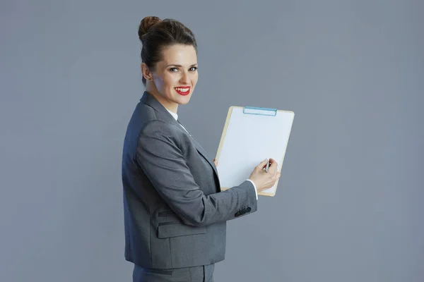 Happy Modern Middle Aged Business Woman Grey Suit Clipboard Isolated — Stock Photo, Image