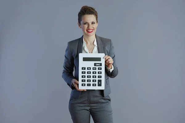 Smiling Trendy Years Old Woman Worker Gray Suit Calculator Isolated — Stock Photo, Image