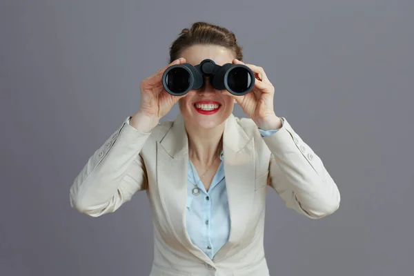 Happy Young Woman Worker Light Business Suit Binoculars Isolated Grey — Stock Photo, Image