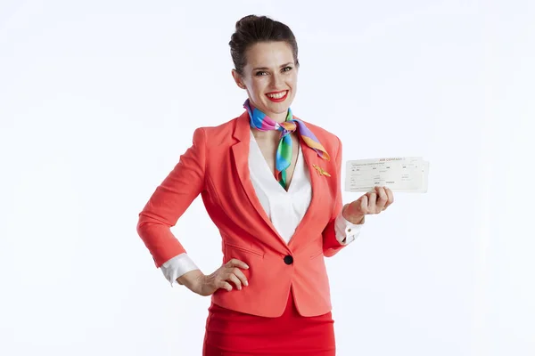 Šťastný Moderní Ženský Letuška Bílém Pozadí Uniformě Letenkami — Stock fotografie