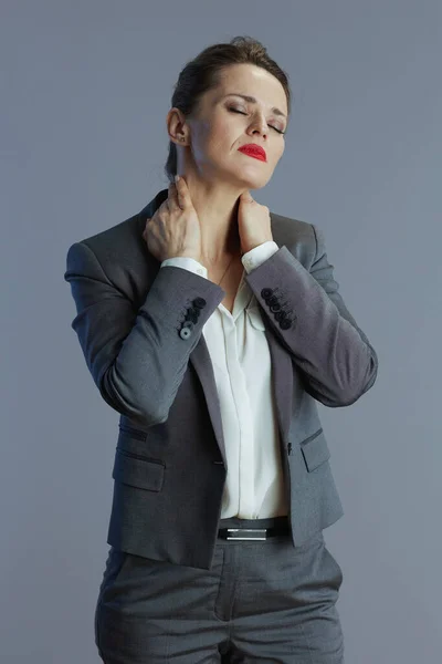Tired Young Female Worker Grey Suit Having Neck Pain Gray — Stock Photo, Image
