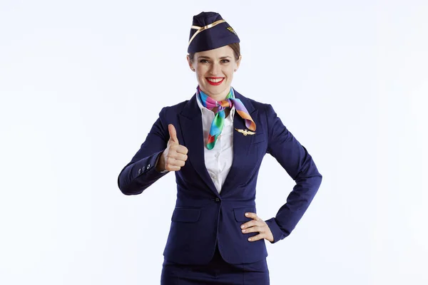 Glad Elegant Kvinnlig Flygvärdinna Mot Vit Bakgrund Uniform Visar Tummen — Stockfoto
