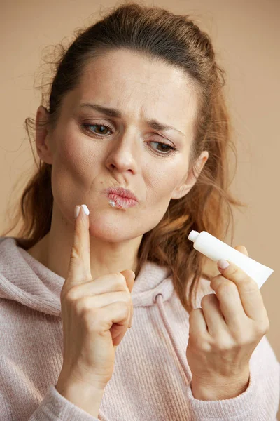 Female Herpes Lips Ointment Tube Applying Ointment Using Finger Isolated — Stock Photo, Image
