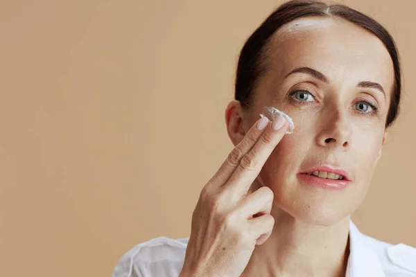 Modern Female Facial Cream Face Beige Background — Stock Photo, Image