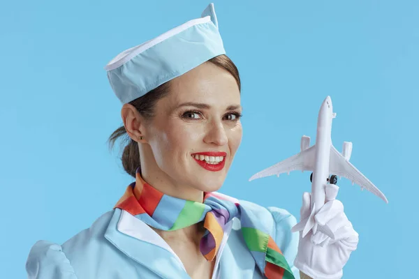Happy Modern Female Flight Attendant Isolado Fundo Azul Uniforme Azul — Fotografia de Stock