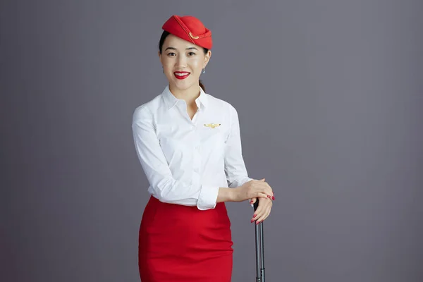 Smiling Stylish Asian Female Stewardess Red Skirt Hat Uniform Travel — Stock Photo, Image