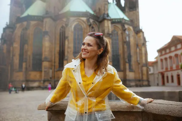 Smiling Young Woman Yellow Blouse Raincoat Prague Czech Republic Sightseeing — Stock Photo, Image