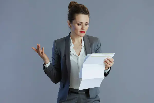 Elegant Years Old Business Woman Gray Suit Document Isolated Gray 图库图片
