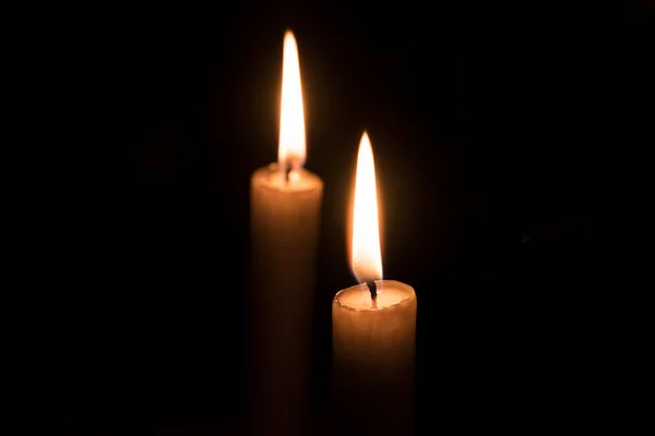 stock image Flame from burning candles on dark background