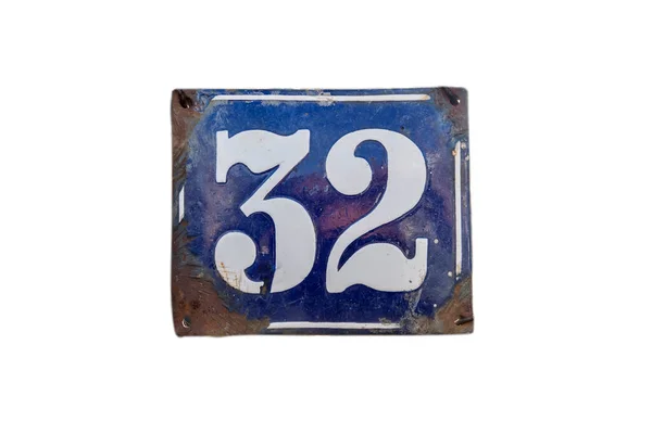 stock image Weathered grunge square metal enameled plate of number of street address with number 32 isolated on white background