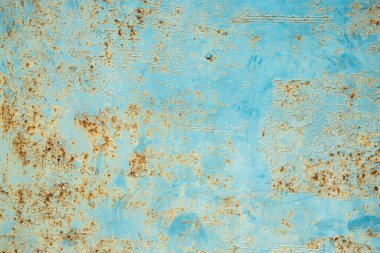 Eski paslı metal levha yüzeyi grunge mavi arka plan olarak yakın çekim