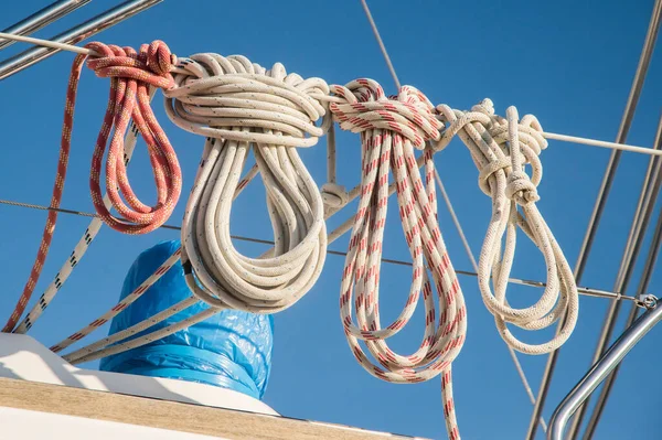Coiled Ship Ropes Railing Motorboat Closeup Fotos de stock