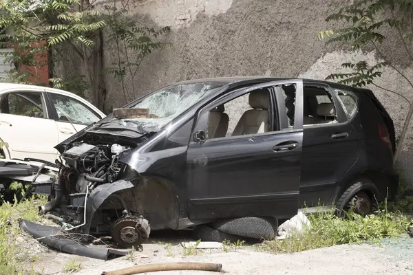 stock image Crashed broken down car in automobile junk scrap yard