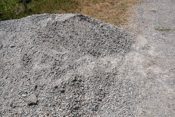 stock image Pile of small gravel during construction of a country road