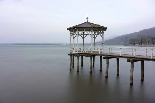 stock image Fishermans footbridge on lake Constance in Bregenz on a stormy day in early spring