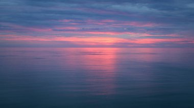 Abstract background of a sunset at the atlantic ocean, long exposure clipart