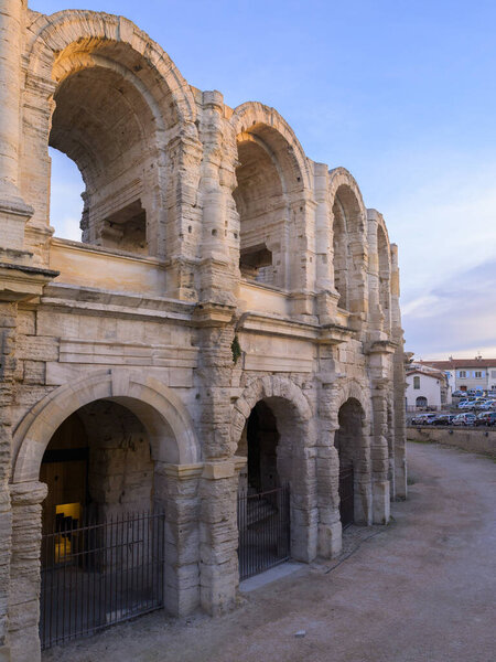 Arles, France - March 13, 2023: The roman Arena of Arles early in the morning, sunrise