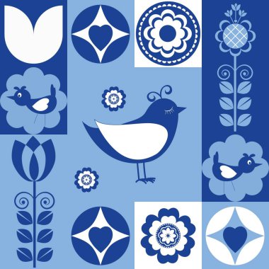 Mavi ve beyaz renkli, çiçekli ve kuşlu fayanslar, arka planda pürüzsüz dekorlar.