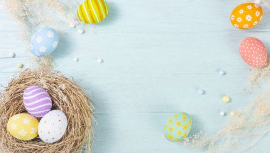 Happy easter Day. Easter eggs on wooden background. Greetings and presents for Easter Day celebrate time. Flat lay ,top view, copy space.