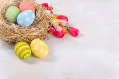 Happy easter Day. Easter eggs on wooden background. Greetings and presents for Easter Day celebrate time. Flat lay ,top view, copy space.