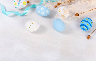 Happy easter Day. Easter eggs on wooden background. Greetings and presents for Easter Day celebrate time. Flat lay ,top view, copy space.