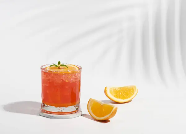 Italian soda strawberry orange on pastel color background. Exotic summer drinks.