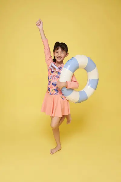 Little Funny Happy Asian Girl Swimsuit Jumping Air Inflatable Ring Royalty Free Stock Images