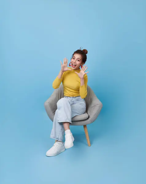 Excited Asian Teen Girl Sitting Chair Open Mouth Screaming Announce Stock Image