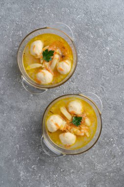 Soup with meatballs and herbs, lunch menu, healthy food