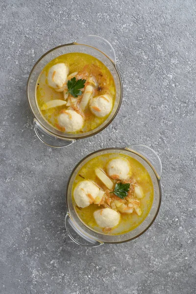 Soup with meatballs and herbs, lunch menu, healthy food