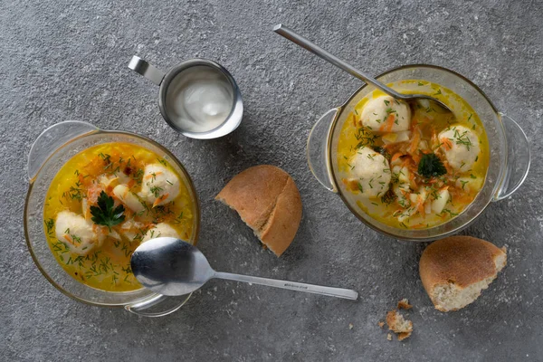 Soup with meatballs and herbs, lunch menu, healthy food