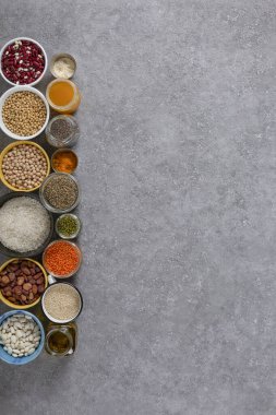Various legumes and cereals in bowls, healthy food, diet, vegetarianism