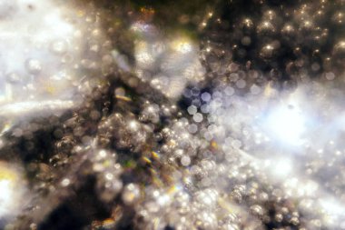 Soyut ışıltılı klasik ışıklar arka planda ve bokeh. odaklanmamış