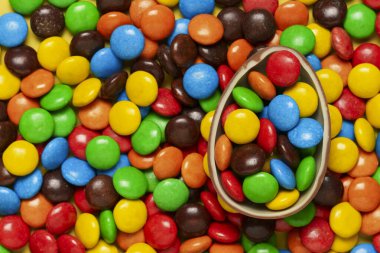 Çikolata yumurtası, Paskalya, şeker arkaplanı, şekerleme