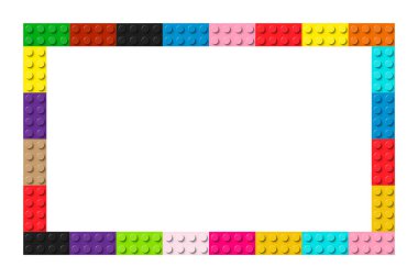 Color frame composed of coloured plastic toy blocks. Colorful brick banner. Abstract vector background clipart