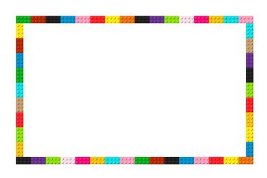 Color frame composed of coloured plastic toy blocks. Colorful brick banner. Abstract vector background